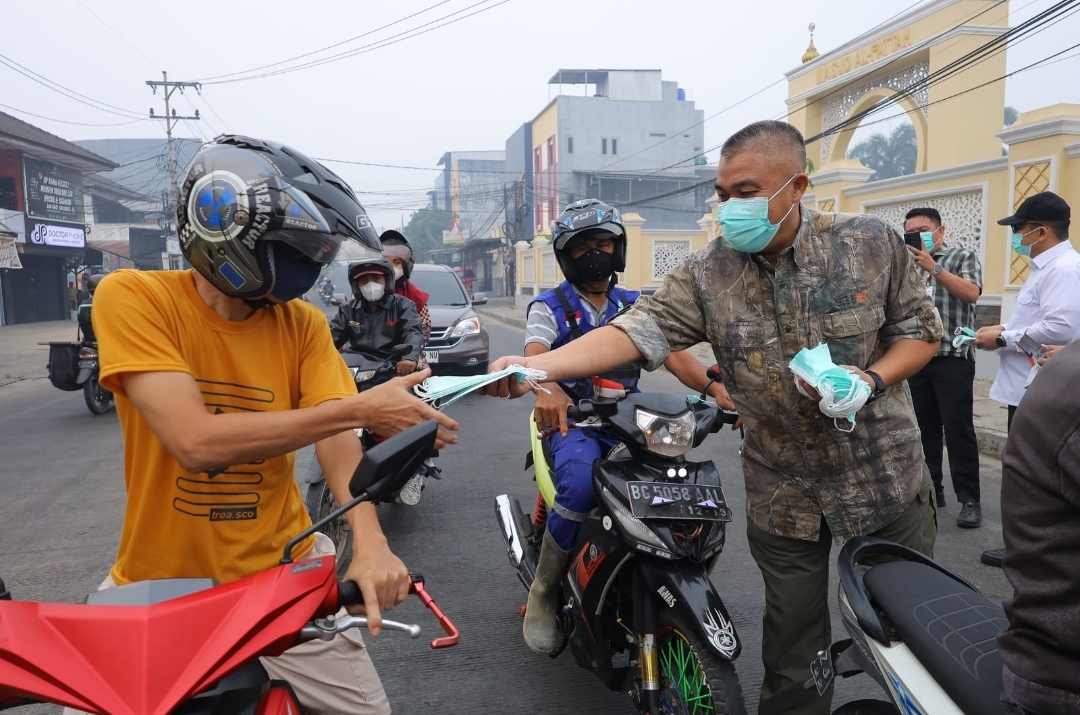 Lindungi Kesehatan Warga, Pemkot Palembang Bagikan 15.000 Masker