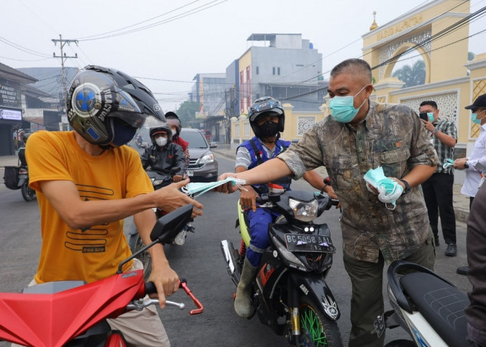 Lindungi Kesehatan Warga, Pemkot Palembang Bagikan 15.000 Masker