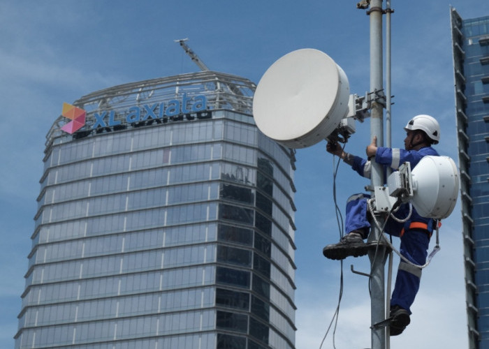 XL Axiata dan Smartfren Resmi Merger Jadi XLSmart, Nilai Gabungan Pra Sinergi Capai Lebih Rp 104 triliun    