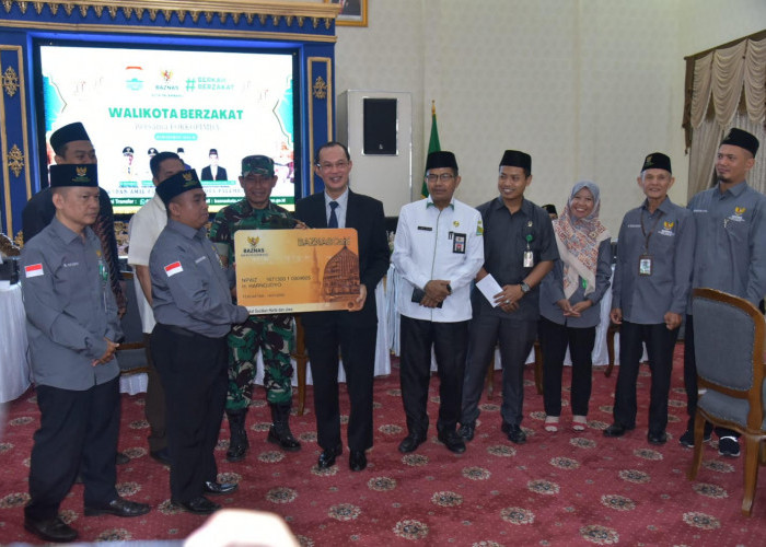 Pemkot Palembang bersama Forkopimda Lakukan Gerakan Zakat