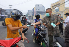 Lindungi Kesehatan Warga, Pemkot Palembang Bagikan 15.000 Masker